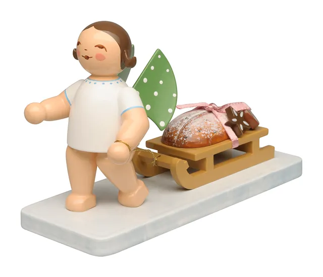 Engel med julekake og ingefærstjerner